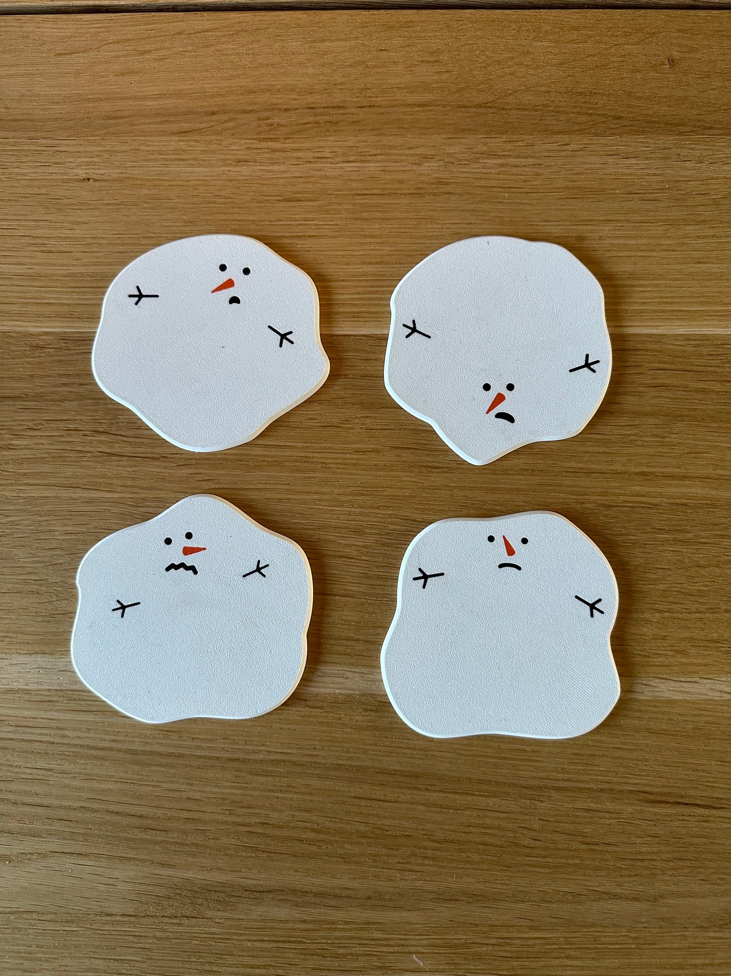 Gesmolten sneeuwpop onderzetters (4 stuks)