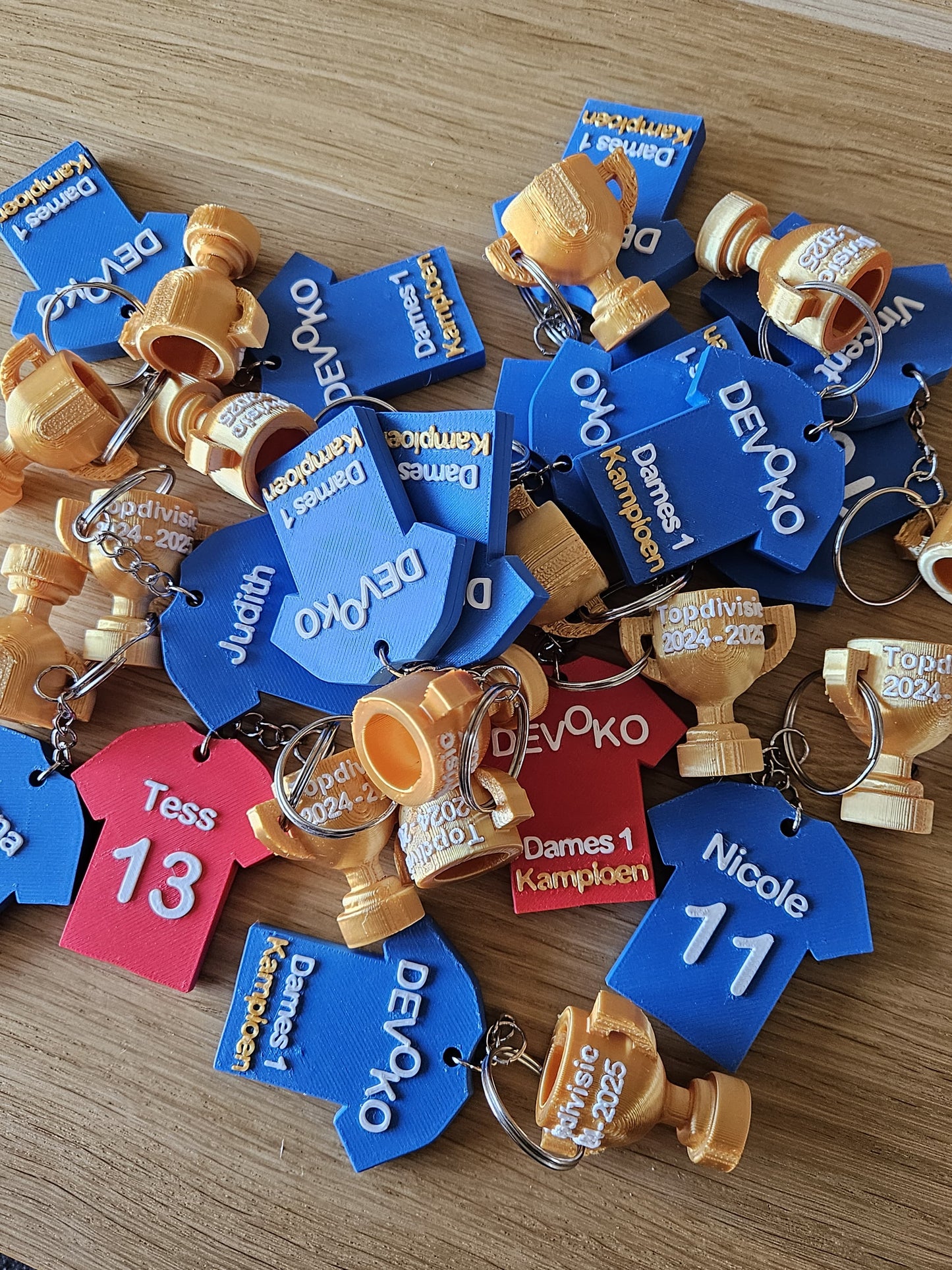Unieke kampioen sleutelhanger als aandenken aan jouw overwinning.